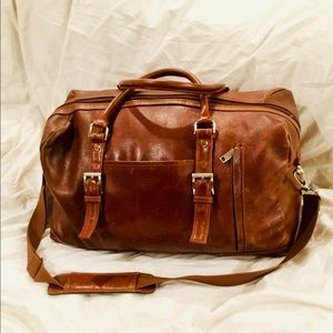 Large tan  leather duffle weekend bag